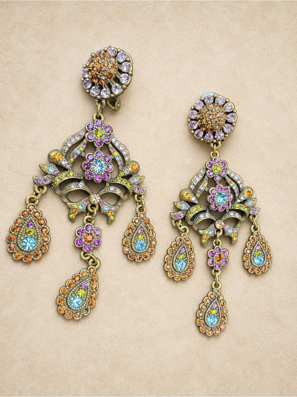 Heidi Daus Antique Gold Chandelier Earrings With Swarovski Crystal Floral Motif.